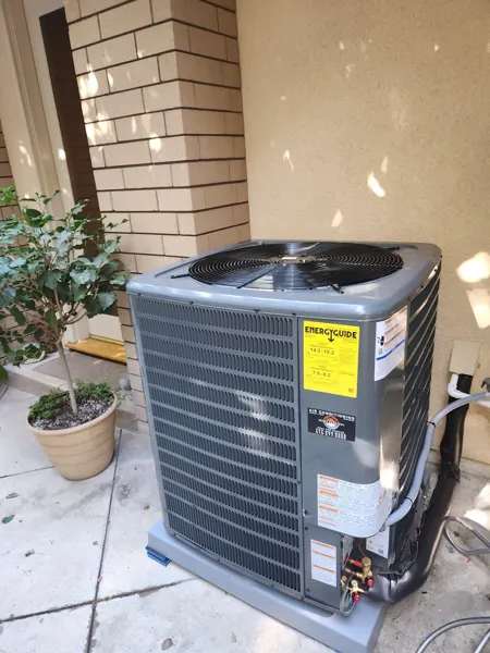 New condenser installed on a patio
