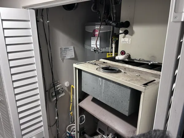 Closet furnace with the panel open
