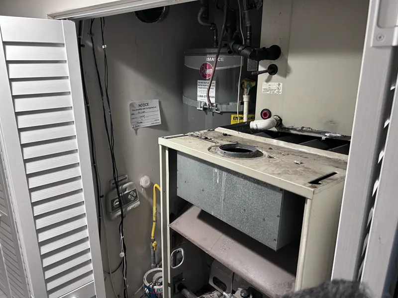 Closet furnace with the panel open