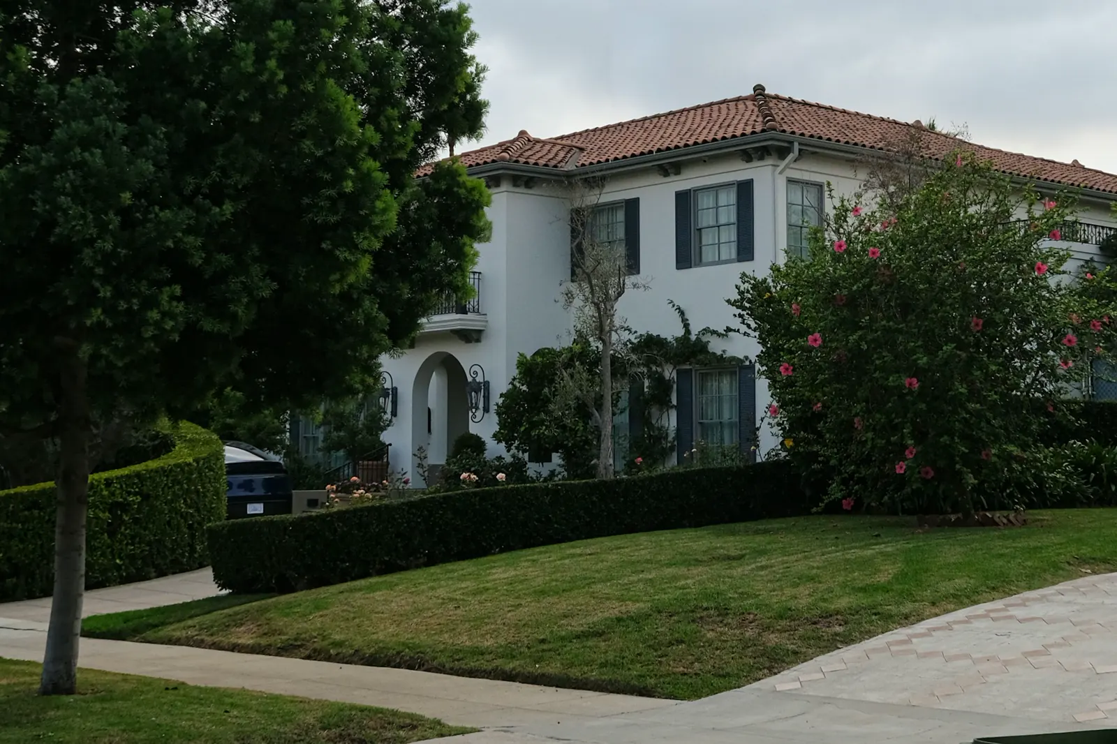 A large white house with a tiled roof