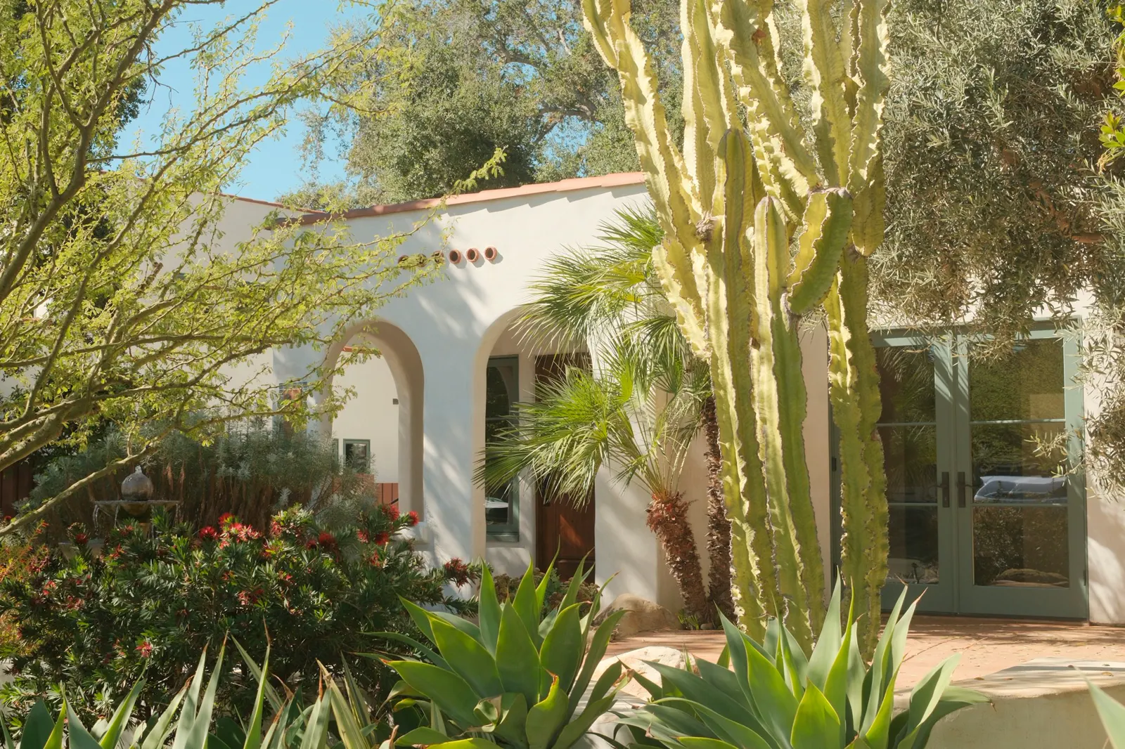 Spanish style house with desert landscaping