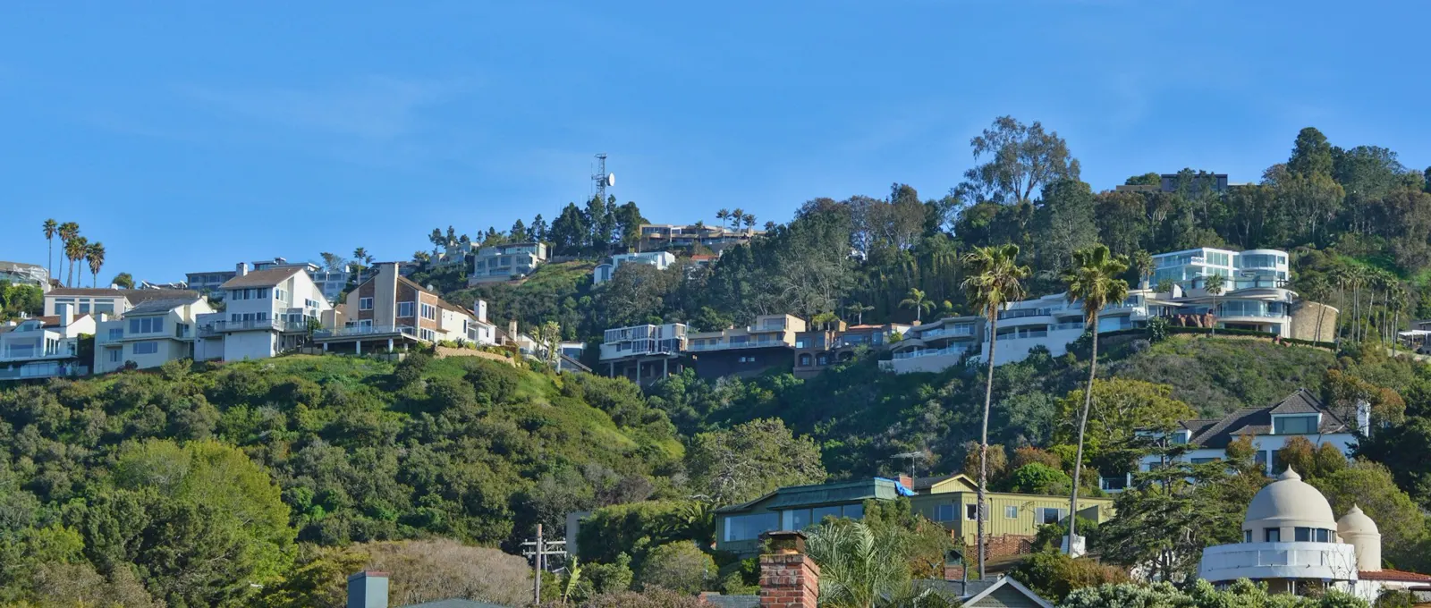 A hill with houses on top of it