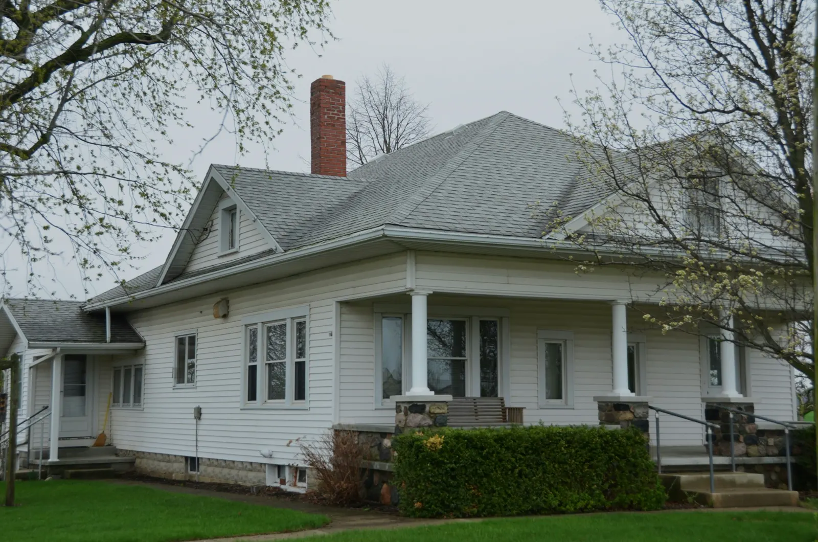 A white house with a front porch