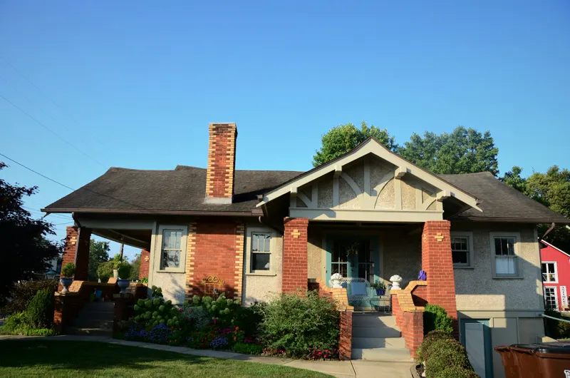 A Craftsman bungalow with brick columns
