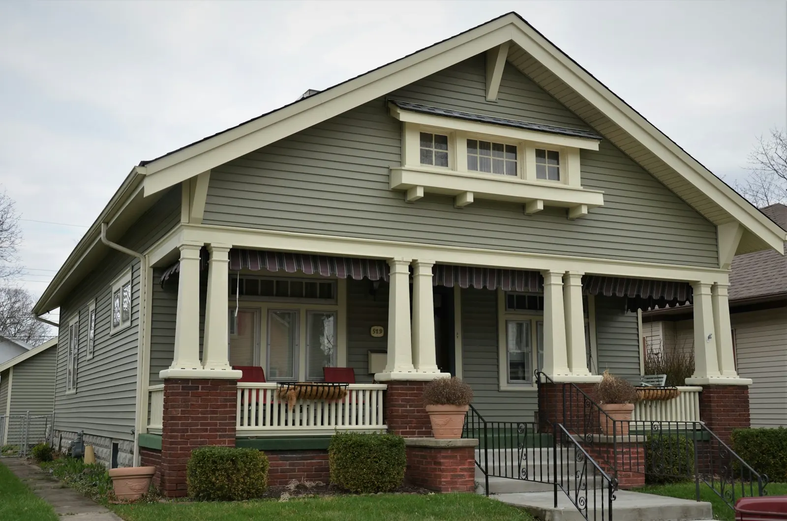 A grey Craftsman bungalow
