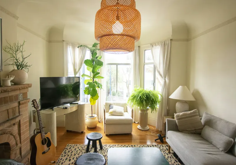 A bright living room with arched doorways