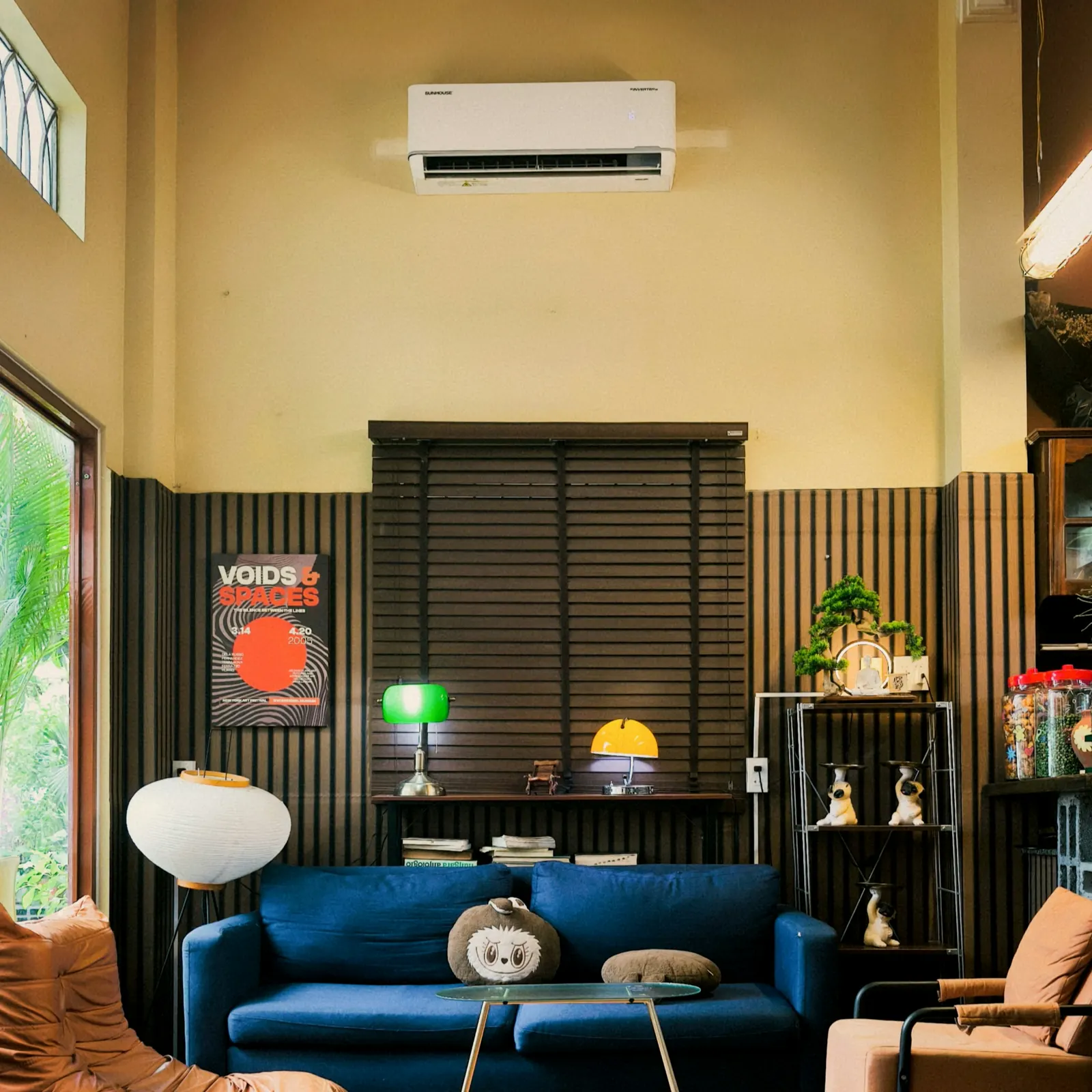 A ductless mini split head on the wall of a living room