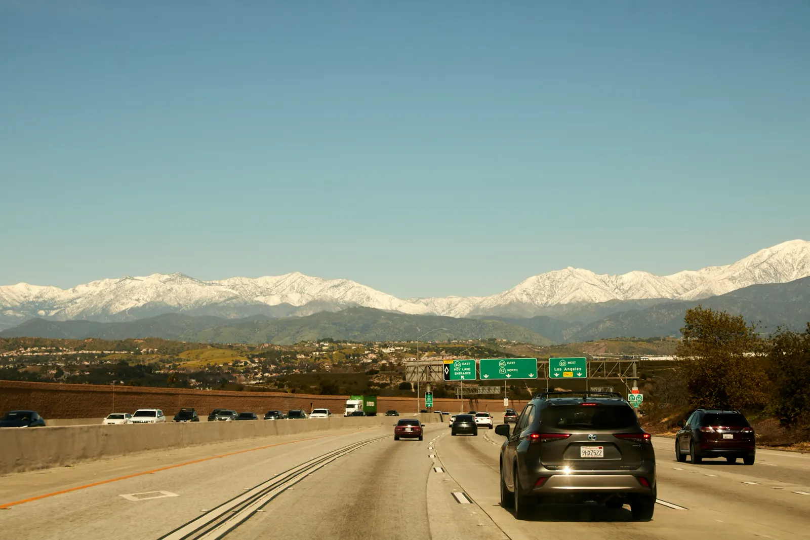 Snow on the San Gabriel Mountains above the freeway